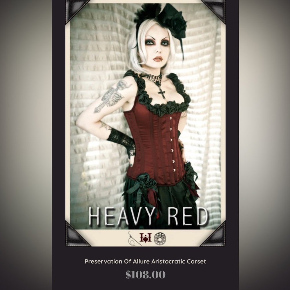 Heavy Red boned corset, size small. Tried on but never actually worn.